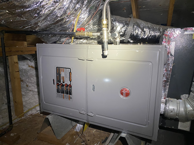 Rheem air handler and ductwork installed in a Texas attic by Texas Heatwave